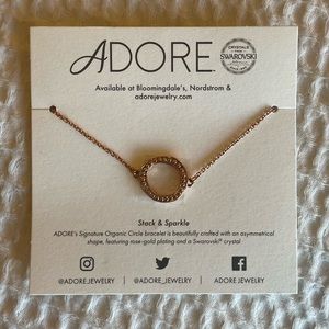 ADORE’s Signature Circle bracelet in rose gold with a Swarovski crystal! NWT